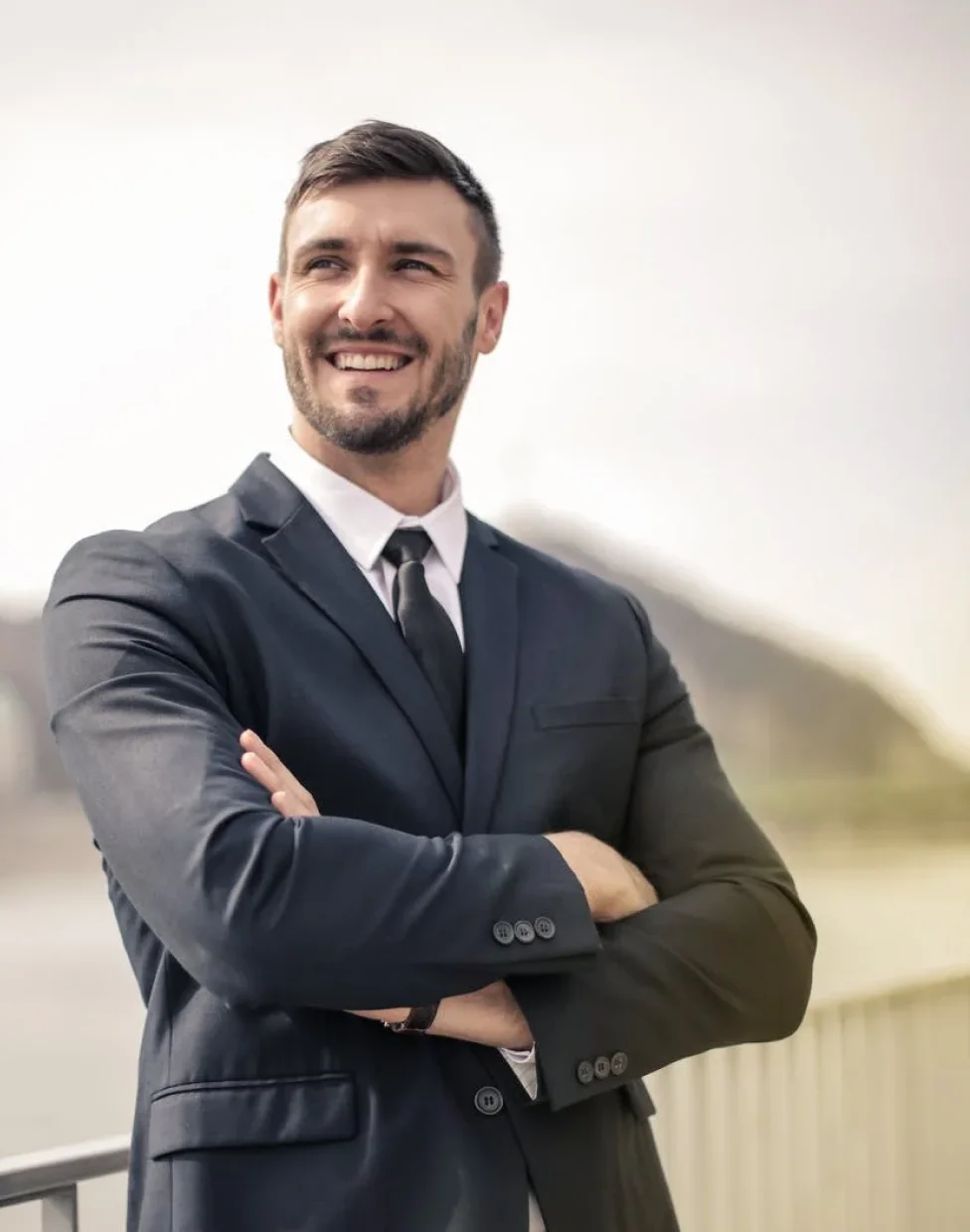smiling expert wearing suit showing confidence